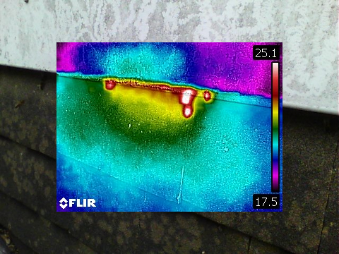 Honey bee removal survey - thermal image of a honey bee colony behind hanging tiles of a flat dormer roof - Aberkenfig, Bridgend, outside Cardiff, Wales - removed by honey bee removal & relocation specialists SwarmCatcher